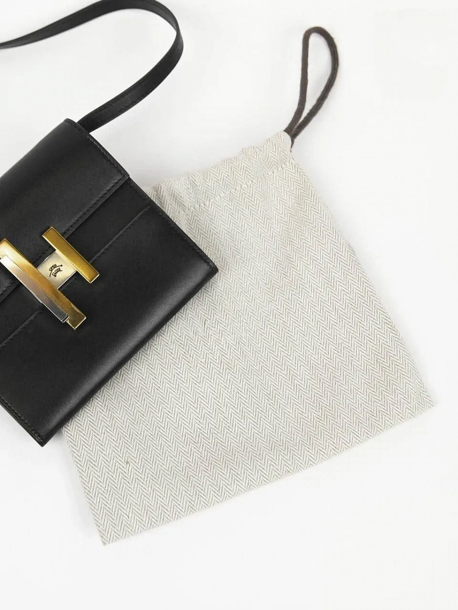 Сумка‑кошелёк женская Hermès Cinhetic To Go Mini чёрная (натуральная кожа) — фирменный пыльник Hermès