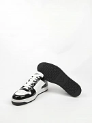 Мужские кроссовки Prada чёрно‑белые лаковые — пара кроссовок и подошва